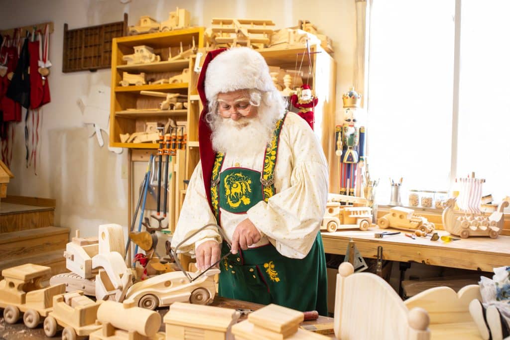 Kringle Working on Handcrafted Wooden Toys in Made In Kringle Workshop